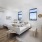 living and kitchen area with natural lighting and ample space for furniture arrangements
