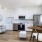 kitchen on wood-style flooring and with easy access to the living room