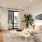 living room with easy access to a patio and on wood-style flooring